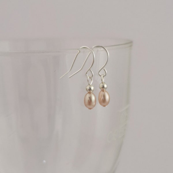 Single tiny 5 mm natural pink freshwater pearl drop earrings. Hypoallergenic hooks.