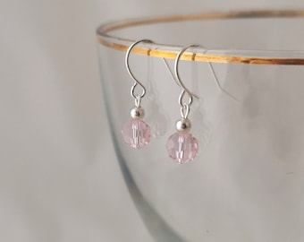 Small baby pink faceted glass earrings. Hypoallergenic and nickel free.