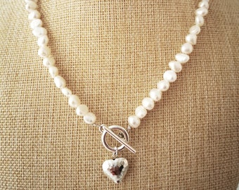 White baroque freshwater pearl necklace with silver toggle clasp and heart detail