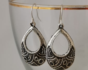 Antique silver colour loop shape earrings
