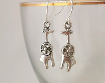 Silver giraffe earrings. Silver plated zinc alloy giraffe earrings. Hypoallergenic and nickel free