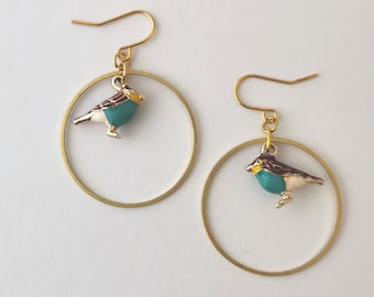 Gold circle and bird earrings