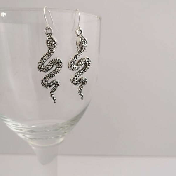 Silver coloured snake earrings