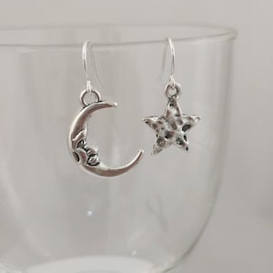 Funky silver moon and star earrings. Silver plated, nickel free hypoallergenic