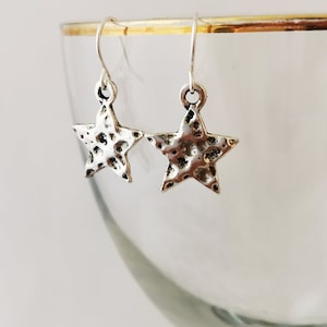 Silver hammered star dangly earrings. Silver plated, nickel free, Hypoallergenic