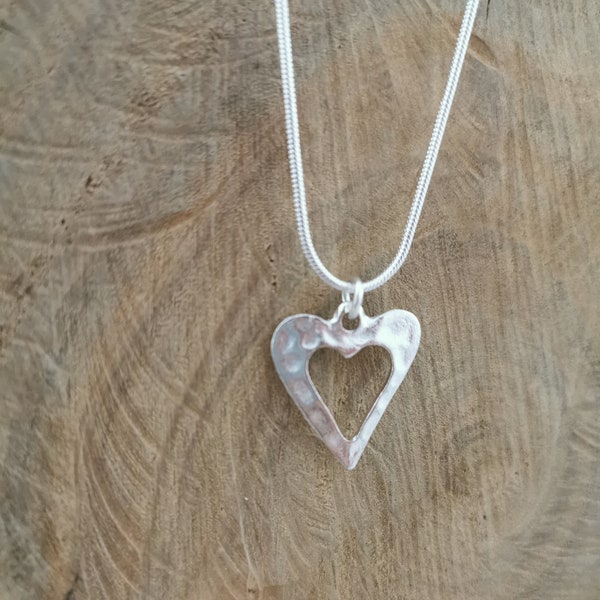Hammered silver heart necklace. Silver plated pendant on silver plated snake chain. 18 inches.