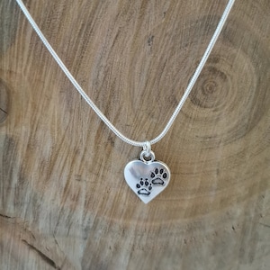 Silver pawprint heart necklace. Silver plated pendant on silver plated snake chain. 18 inches. image 1