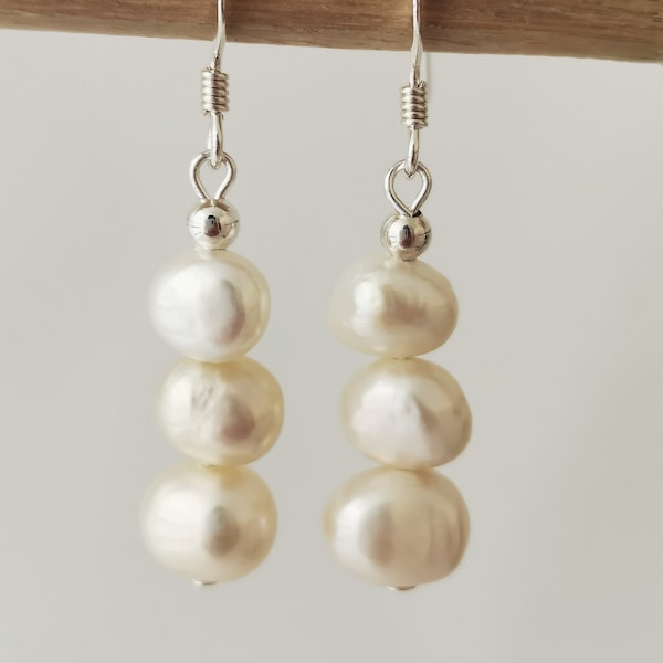 Triple white baroque freshwater pearl drop earrings on sterling silver hooks