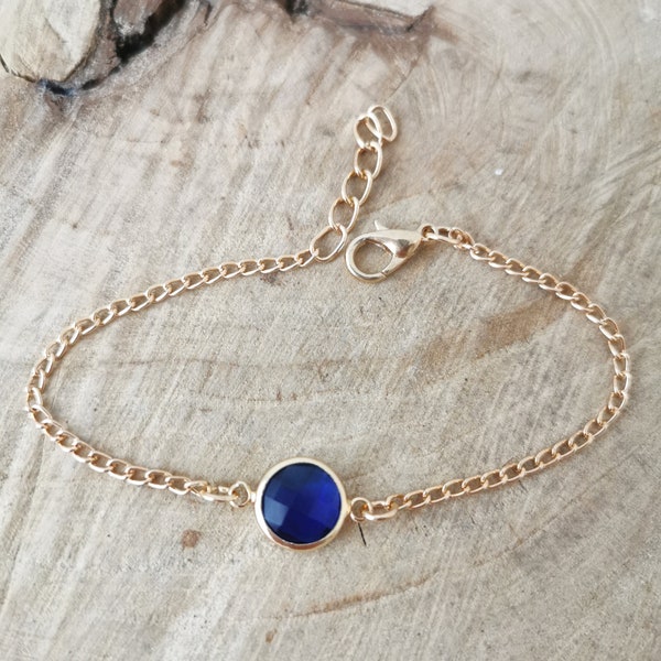 Gold and blue bracelet. Faceted blue glass and gold plated bracelet