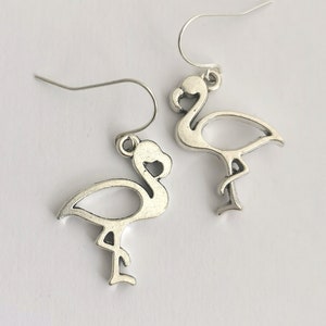 Dangly silver flamingo earrings
