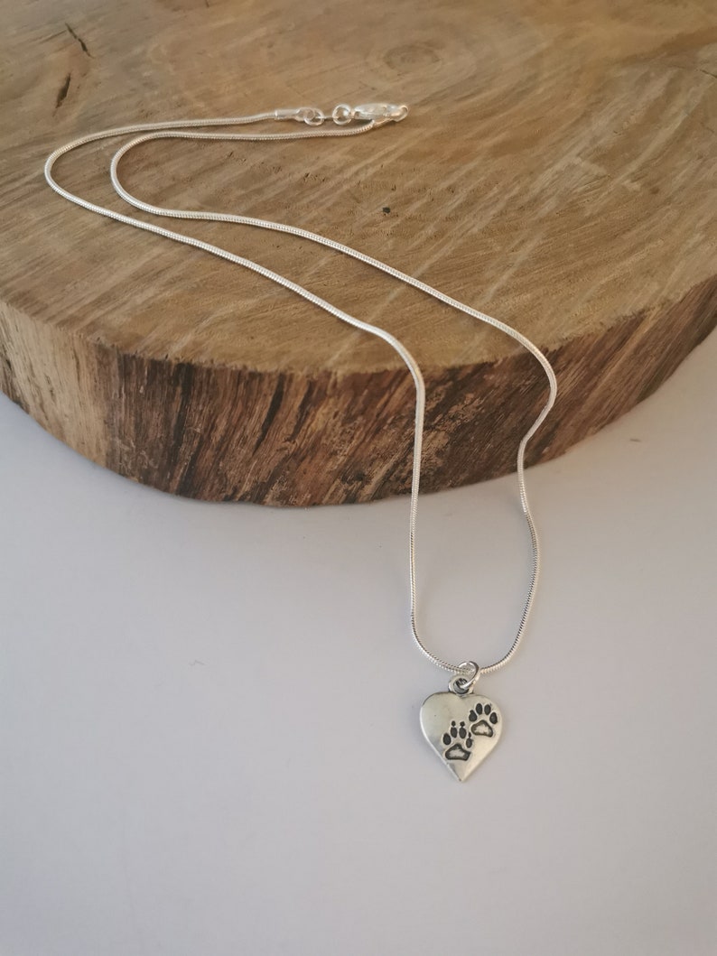 Silver pawprint heart necklace. Silver plated pendant on silver plated snake chain. 18 inches. image 3