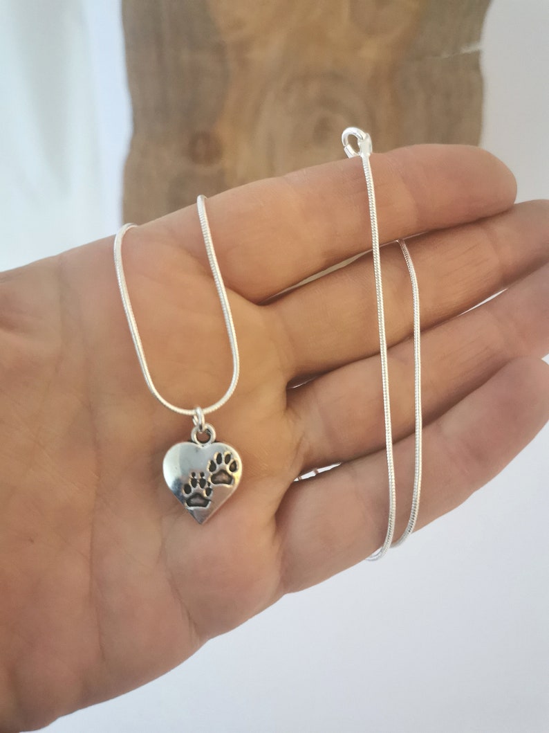 Silver pawprint heart necklace. Silver plated pendant on silver plated snake chain. 18 inches. image 4