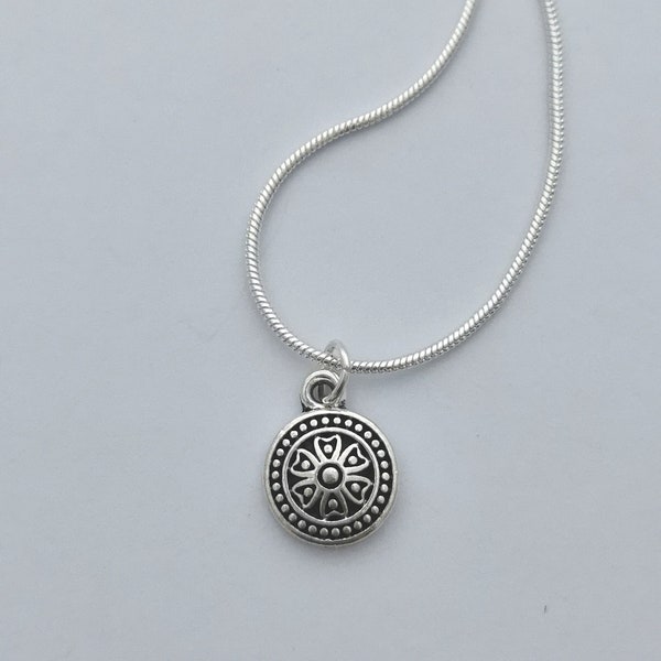 Silver mandala necklace necklace. Silver plated pendant on silver plated snake chain. 18 inches.