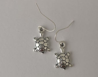 Small silver plated turtle earrings. Silver plated, nickel free and hypoallergenic