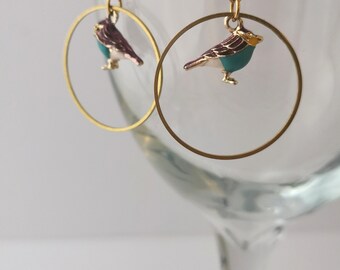 ゴールドのサークルと鳥のイヤリング - Etsy 日本