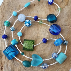 Funky long mixed blue green and turquoise necklace.