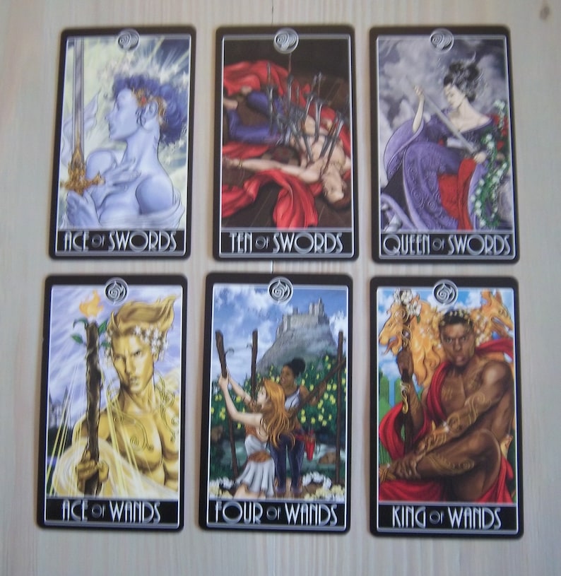 May include: Tarot card deck featuring ten cards with illustrations of people and symbols. The cards are black with silver trim and feature the suits of swords and wands. The cards include Ace of Swords, Ten of Swords, Queen of Swords, Ace of Wands, Four of Wands, and King of Wands.