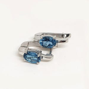 Oval London Blue Topaz Earrings: 925 Sterling Silver