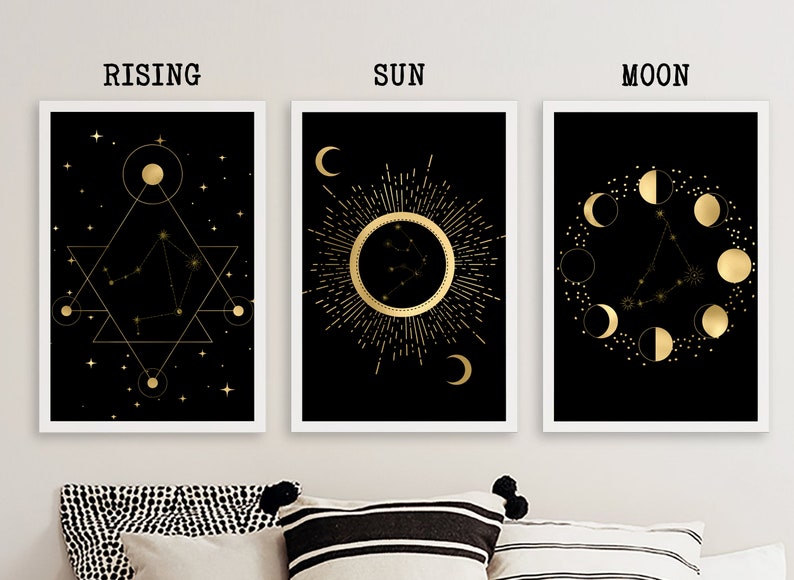 May include: Three black and gold framed prints with the words "Rising", "Sun", and "Moon" above each print. Each print features a gold constellation of Libra with geometric shapes, a sunburst, and a crescent moon.