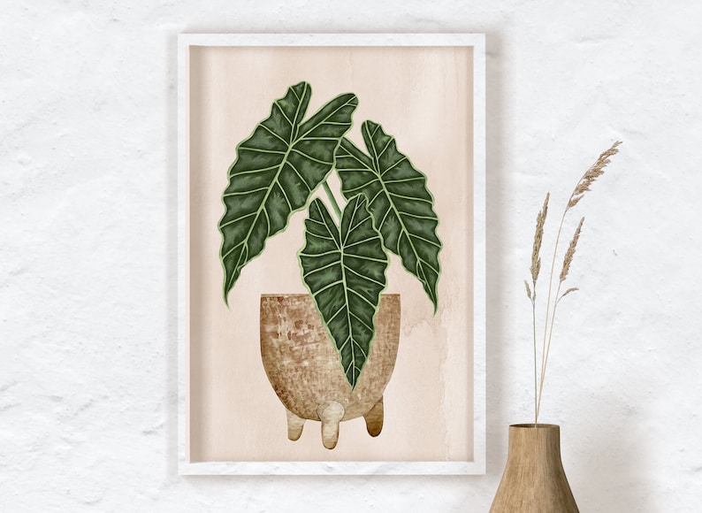 May include: A framed illustration of a green leafy plant in a brown pot with three legs. The background is a light pink color.