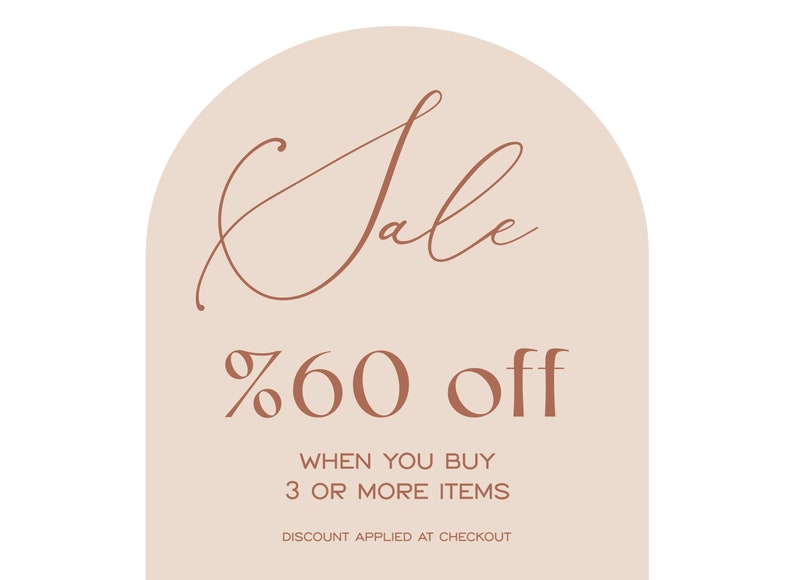 May include: A peach-colored arch with the word "Sale" in a brown cursive font. The text below reads "60% off" in brown font. The text below that reads "When you buy 3 or more items. Discount applied at checkout."