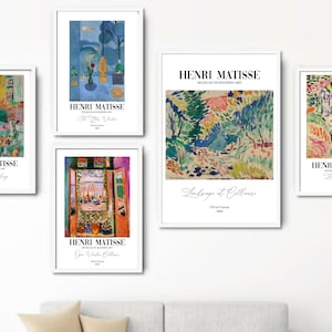 May include: Set of five framed art prints featuring colorful abstract paintings by Henri Matisse. The prints include "Le Japonais", "The Blue Window", "Goldfish", "Landscape at Collioure", and "The Window at Collioure".