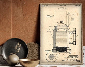 Puede incluir: Un dibujo de patente vintage en blanco y negro de una cafetera con tapa y asa. El número de patente es 1.761.354 y la fecha es el 3 de junio de 1930. La patente es para una cafetera diseñada por E.P. McClure.
