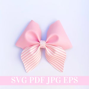 May include: A pink bow with white stripes and a sparkly centre. The bow is made of fabric and is perfect for adding a touch of whimsy to any outfit.