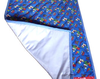 Baby changing mat on the go, Portable nappy change mat, Blue and red toy themed changing mat with waterproof lining