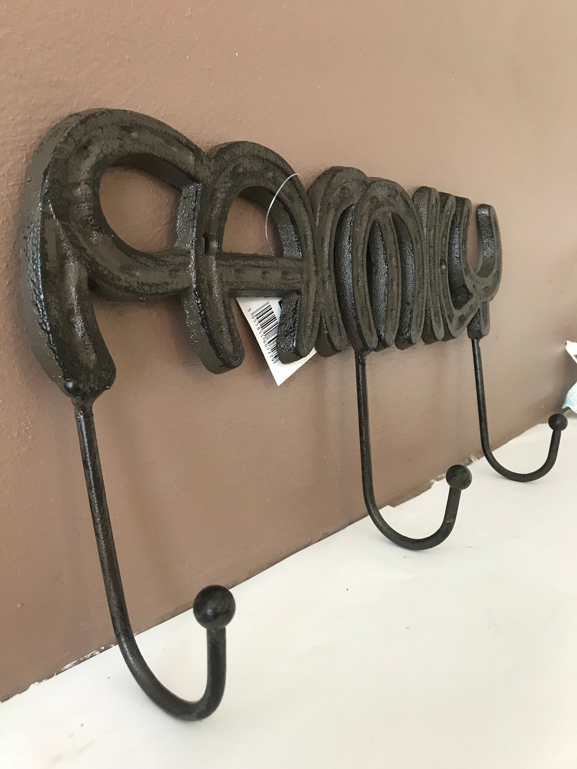 cast iron coat hanger