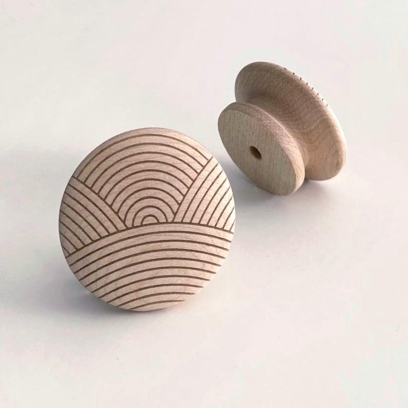 May include: A set of three ceramic mugs with a speckled, matte finish. The mugs are in shades of cream, light gray, and dark gray. Each mug has a simple, minimalist design, perfect for coffee or tea.