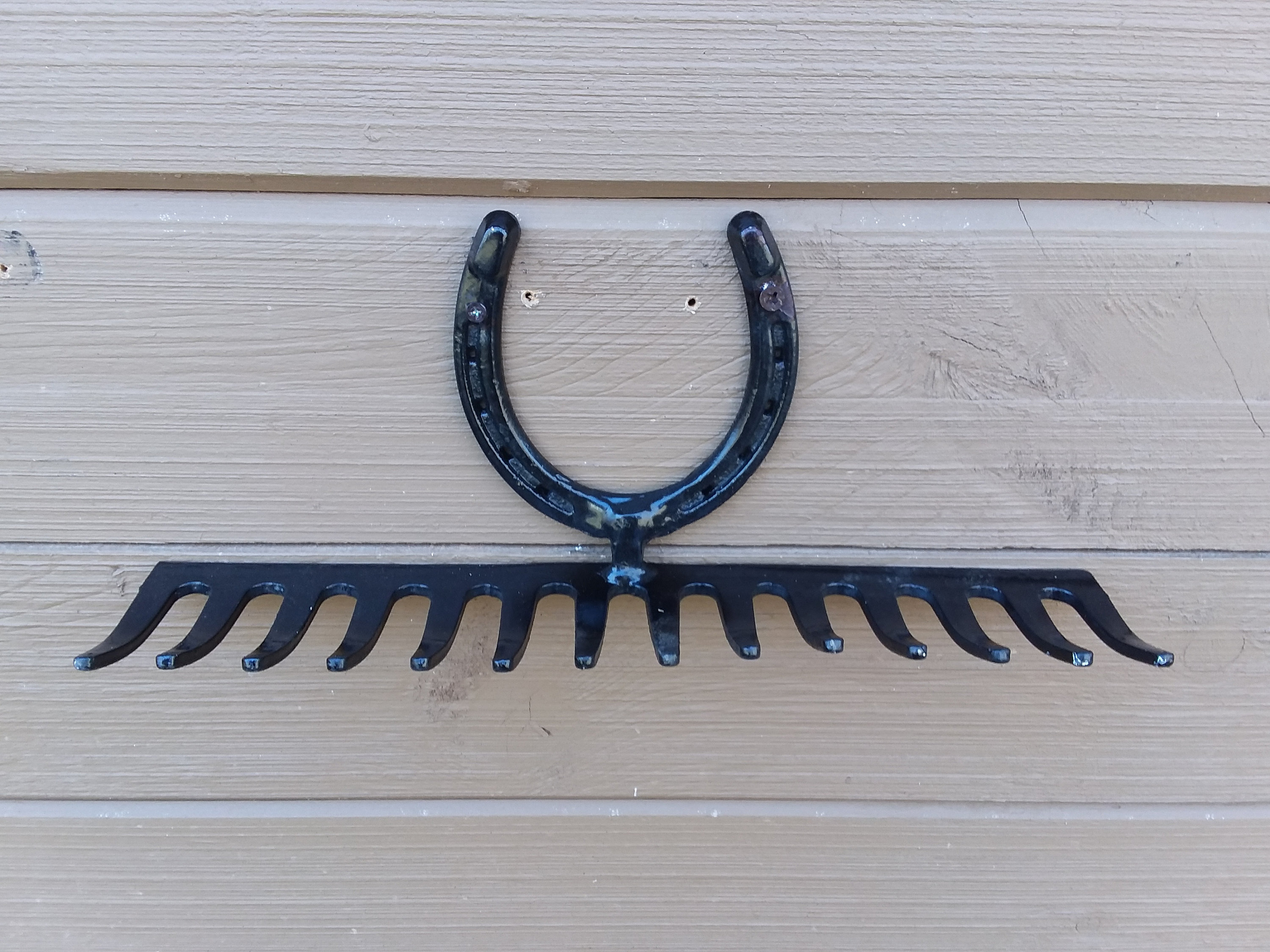 Wrought iron rake rack Etsy