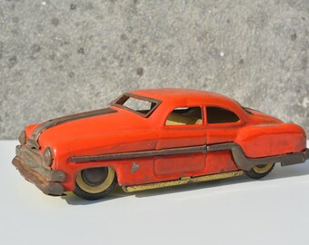 vintage tine plate 1950 Pontiac Minister diecast car