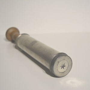 vintage whipped cream / dough syringe