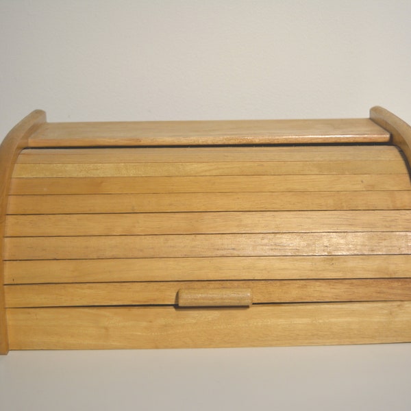 vintage wooden bread box with roll top