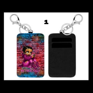Cartera con llavero de Betty Boop: "¡Les dijimos a todos!" - Tarjetero de cuero sintético - Minicartera elegante y atrevida - Regalo de dibujos animados retro