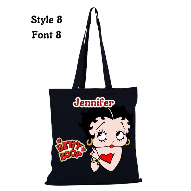 May include: Black canvas tote bag with a red and white Betty Boop graphic and the name Jennifer printed in red.