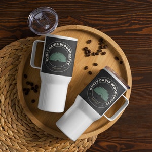 Travel mug with a handle