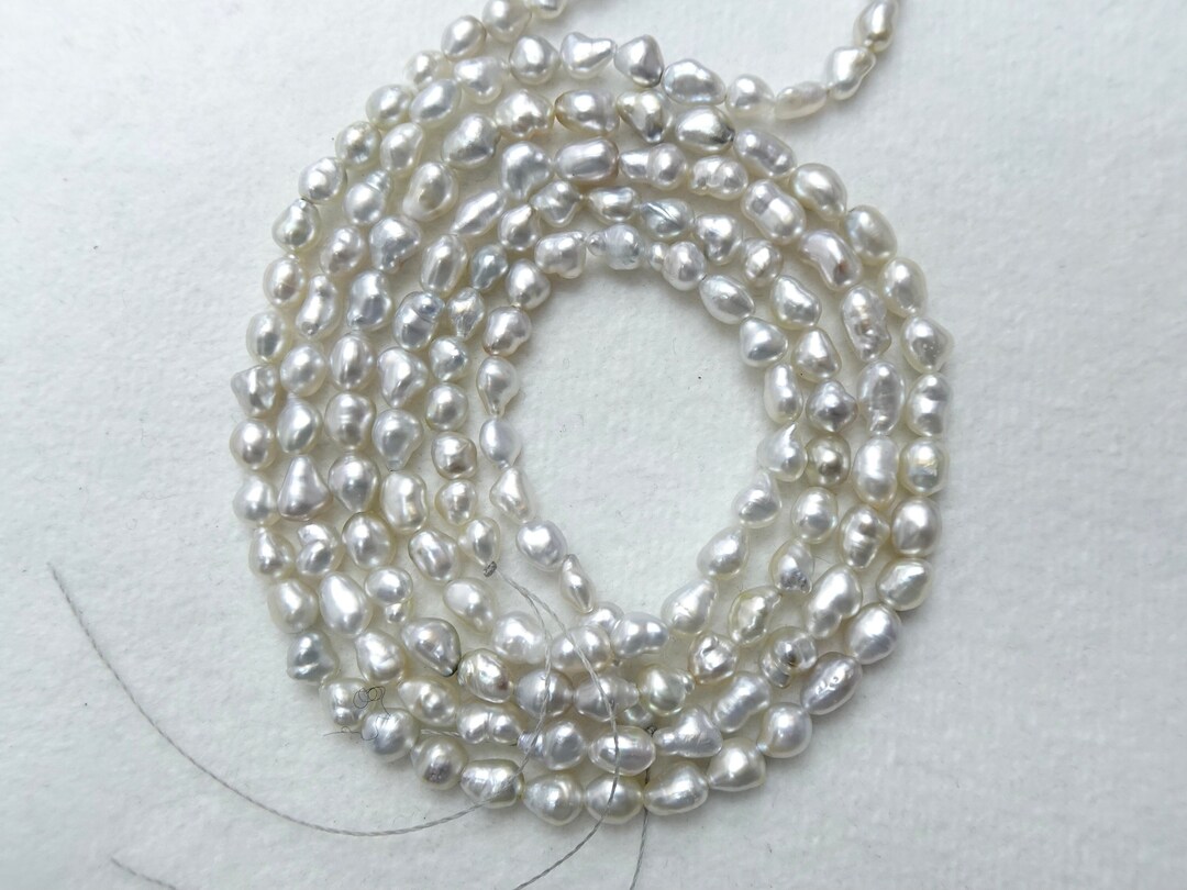 Natural Silver Color and Champagne Undertones, Tahitian Keshi Pearl