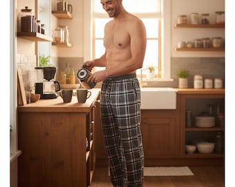 May include: Full-length lounge pants featuring a dark gray, white, and black plaid pattern. The pants have a button-front fly, a drawstring waistband, and a relaxed fit. The fabric has a soft texture, and the design includes a classic grid check.