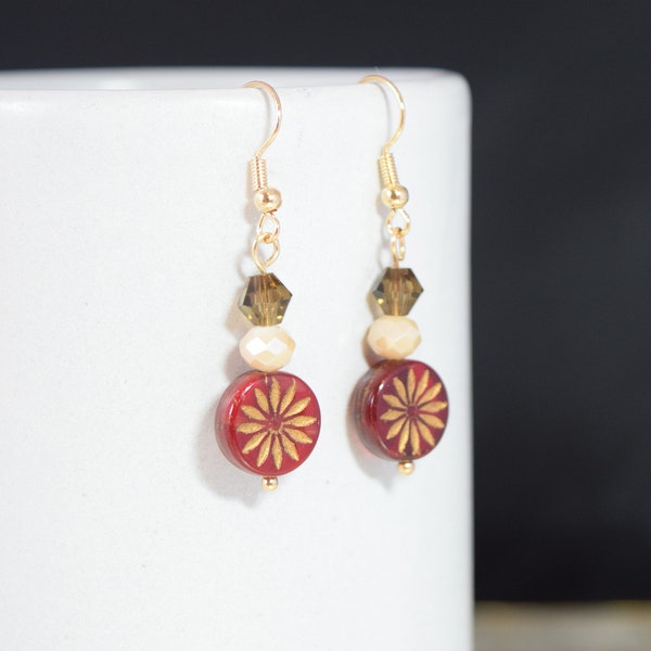 Womens Girls Earrings:  Gold Aster daisy, Sun in Red Czech Glass bead, holiday star sunburst, sun earrings