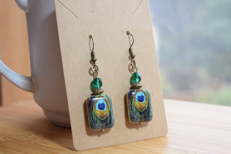 pretty gift for her with blue green czech glass bead Boho Earrings Dreamcatcher inspired Peacock feather on stone