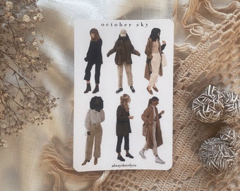 May include: A sheet of stickers featuring illustrations of women wearing fall outfits. The stickers are on a white background with the text "october sky" and "alwayslovelyco".