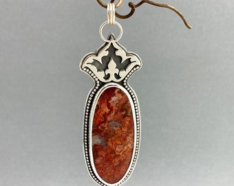 Red Crazy Lace Agate Pendant with Lotus Motif