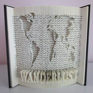 Arte do livro dobrado Wanderlust