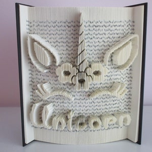 Arte de livro dobrado de unicórnio