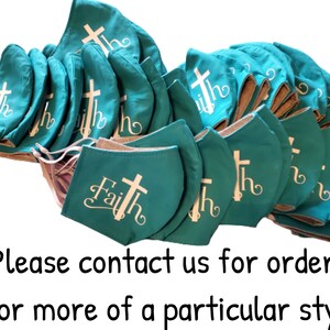May include: A stack of teal blue fabric face masks with white embroidery of a cross and the word "Faith".  Please contact us for orders of 10 or more of a particular style.