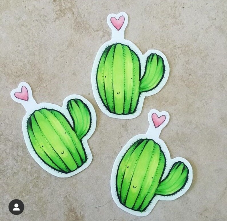 May include: Three green cactus stickers with pink hearts on top. Each cactus has a smiling face and a single arm.