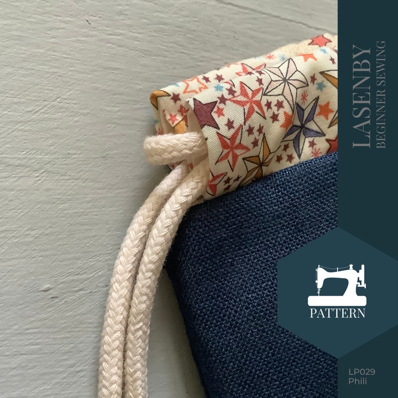 May include: A close-up of a drawstring bag with a navy blue canvas base and a colorful star print lining. The bag has a white drawstring and the text "LASENBY BEGINNER SEWING" is printed on the right side of the image. The text "PATTERN" is printed below a sewing machine icon. The text "LP029 Phili" is printed in the bottom right corner.