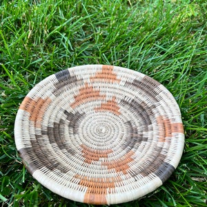 One-of-a-kind beautiful handwoven baskets from Africa. Made by the women of Etsha, a village in the Northern part of Botswana.